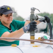 Keystone Propane technician filling a tank.