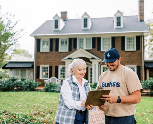 Euliss technician working with customer (custom photography)